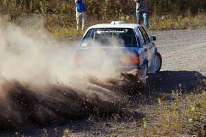 Scott Sanford / Joel Sanford in their BMW 325i on SS1 (Green Acres I)