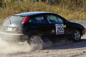 Pawel Dubina / Karol Dubina in their Ford Focus on SS1 (Green Acres I)