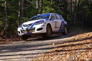 Eric Burmeister / Dave Shindle in their Mazda MAZDASPEED 3 on SS3 (Herman I)