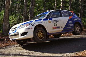 Eric Burmeister / Dave Shindle in their Mazda MAZDASPEED 3 on SS3 (Herman I)
