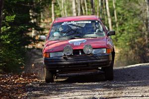 Paul Donlin / Billy Mann in their Ford Escort on SS3 (Herman I)