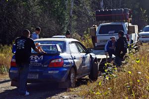 The Carl Siegler / Dave Goodman Subaru WRX STi goes onto the trailer after DNF'ing on SS3 (Herman I)