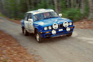 Scott Sanford / Joel Sanford in their BMW 325i on SS5 (Herman II) after getting pulled back onto the road.