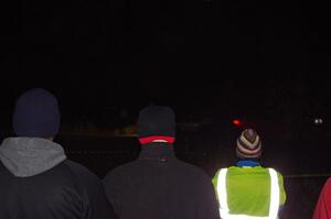 Spectators and a marshal watch as the Dodge SRT-4 of Doug Shepherd / Karen Wagner passes by.