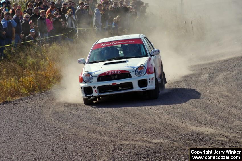 Yurek Cienkosz / Mariusz Malik in their Subaru WRX on SS1 (Green Acres I)