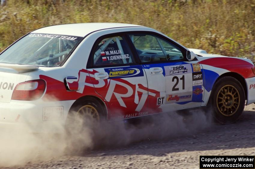 Yurek Cienkosz / Mariusz Malik in their Subaru WRX on SS1 (Green Acres I)