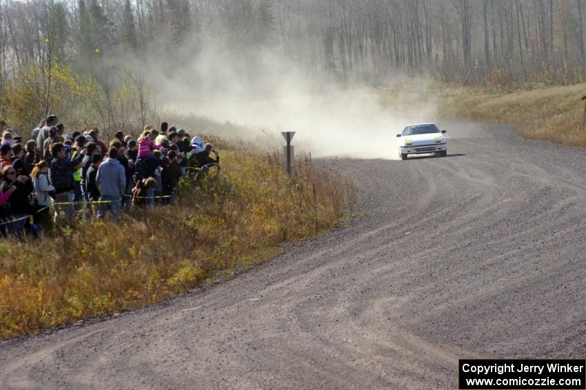 Mychal Summers / Ryan DesLaurier in their Mazda RX-7 on SS1 (Green Acres I)