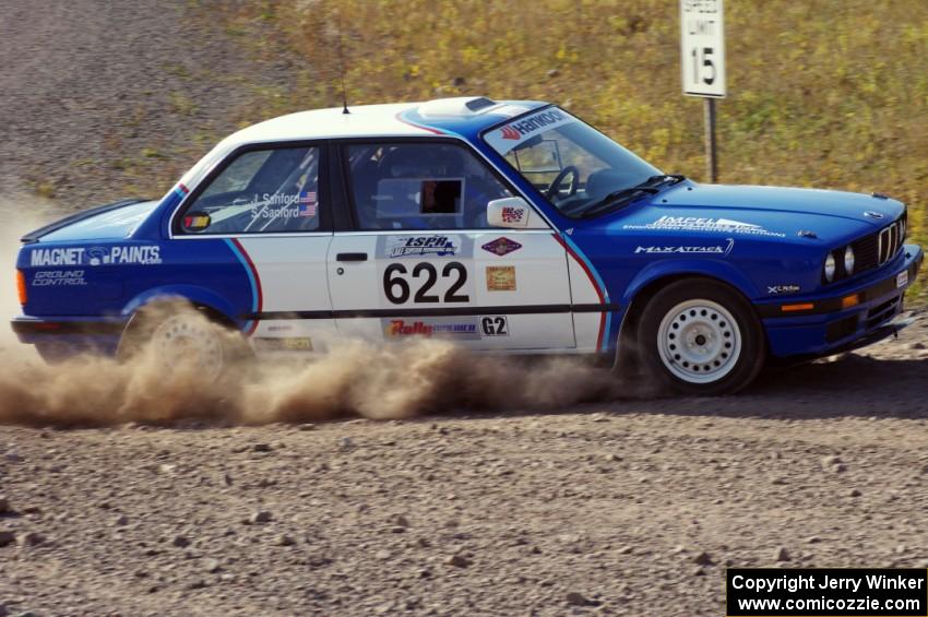 Scott Sanford / Joel Sanford in their BMW 325i on SS1 (Green Acres I)