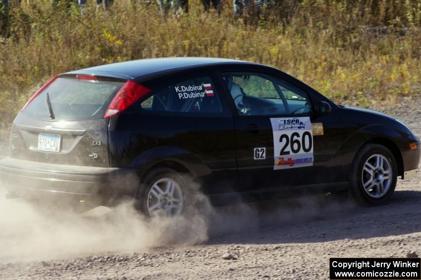 Pawel Dubina / Karol Dubina in their Ford Focus on SS1 (Green Acres I)