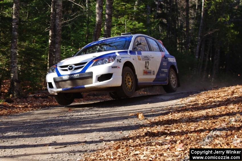 Eric Burmeister / Dave Shindle in their Mazda MAZDASPEED 3 on SS3 (Herman I)