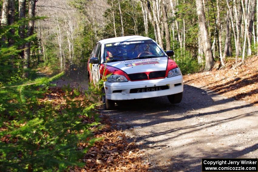 Jan Zedril / Jody Zedril in their Mitsubishi Lancer ES on SS3 (Herman I)