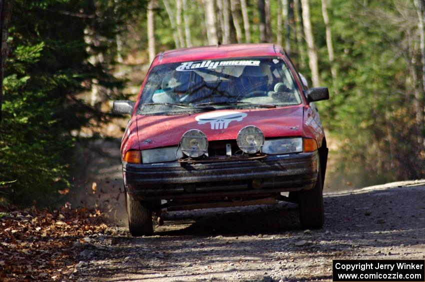 Paul Donlin / Billy Mann in their Ford Escort on SS3 (Herman I)