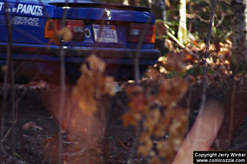 Scott Sanford / Joel Sanford in their BMW 325i on SS3 (Herman I)