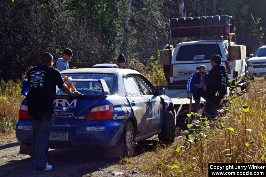 The Carl Siegler / Dave Goodman Subaru WRX STi goes onto the trailer after DNF'ing on SS3 (Herman I)