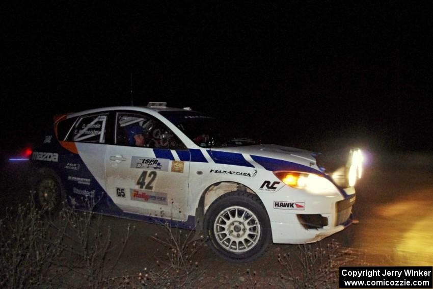 Eric Burmeister / Dave Shindle in their Mazda MAZDASPEED 3 on SS10 (Far Point II)