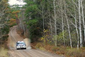 Adam Yeoman / Jordan Schulze in their Subaru Impreza near the finish of SS10 (Menge Creek 1)