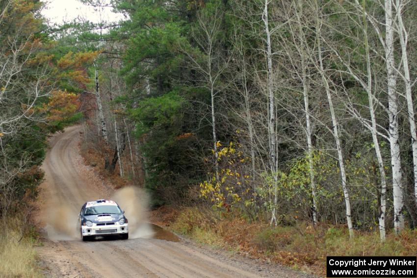 Adam Yeoman / Jordan Schulze in their Subaru Impreza near the finish of SS10 (Menge Creek 1)