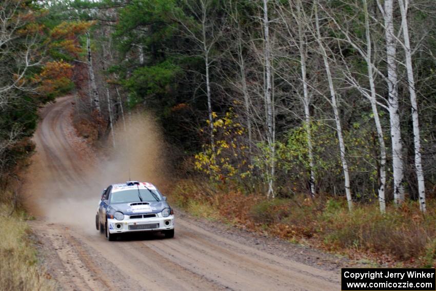 Adam Yeoman / Jordan Schulze in their Subaru Impreza near the finish of SS10 (Menge Creek 1)