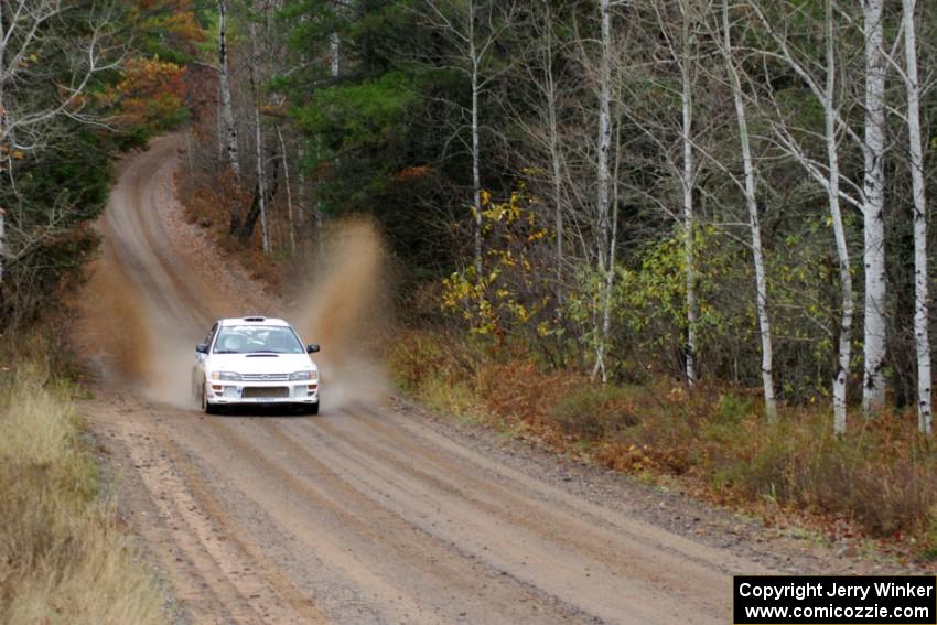 Henry Krolikowski / Cindy Krolikowski in their Subaru Impreza near the finish of SS10 (Menge Creek 1)