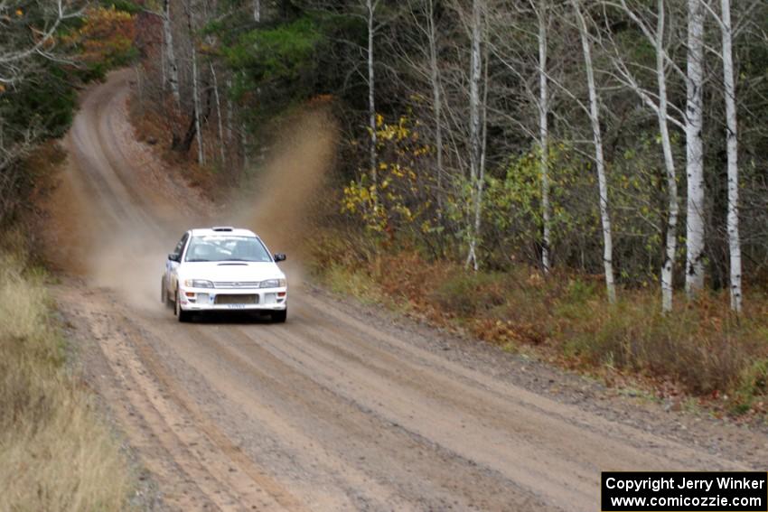 Henry Krolikowski / Cindy Krolikowski in their Subaru Impreza near the finish of SS10 (Menge Creek 1)