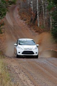 Joseph Burke / Alex Kihurani in their Ford Fiesta R2 near the finish of SS10 (Menge Creek 1)