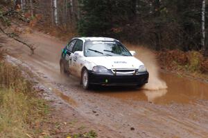 Billy Mann / Mary Warren in their Honda Civic near the finish of SS10 (Menge Creek 1)
