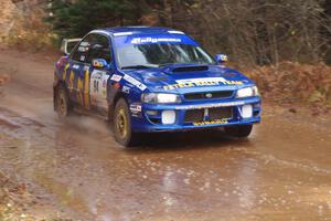 Piotr Fetela / Ray Vambuts in their Subaru Impreza STi near the finish of SS10 (Menge Creek 1)