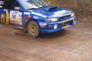 Piotr Fetela / Ray Vambuts in their Subaru Impreza STi near the finish of SS10 (Menge Creek 1)