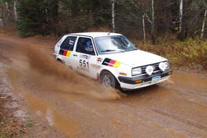 Kristofer Yahner / Tony Benusa in their VW Golf near the finish of SS10 (Menge Creek 1)