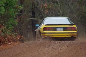 Mychal Summers / Ryan DesLaurier in their Mazda RX-7 on SS10 (Menge Creek 1)