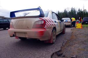 Janusz Topor / Michal Kaminski in their Subaru WRX STi about to head back out after L'Anse service