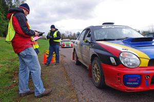 Janusz Topor / Michal Kaminski in their Subaru WRX STi about to head back out after L'Anse service