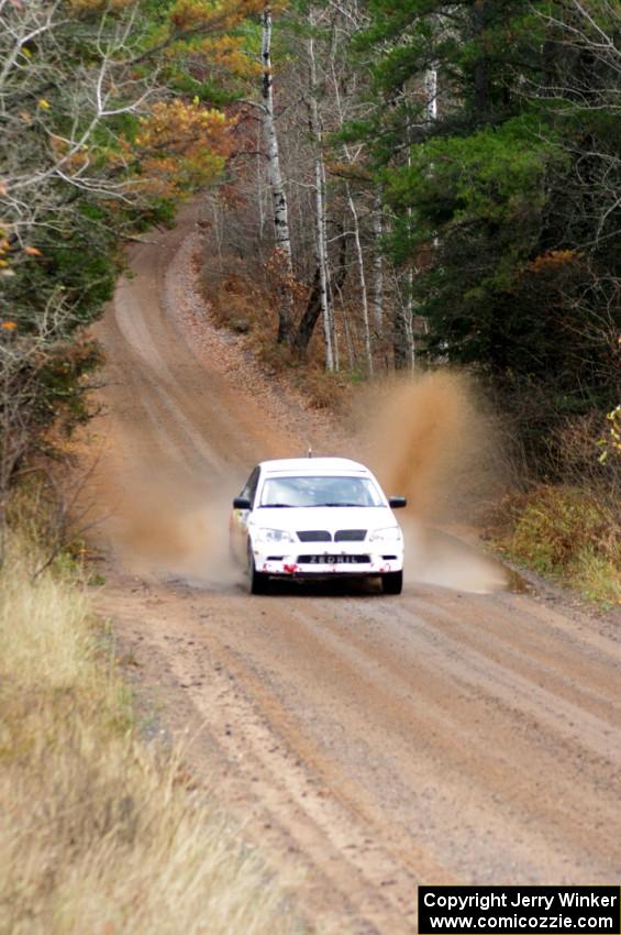 Jan Zedril / Jody Zedril in their Mitsubishi Lancer ES near the finish of SS10 (Menge Creek 1)