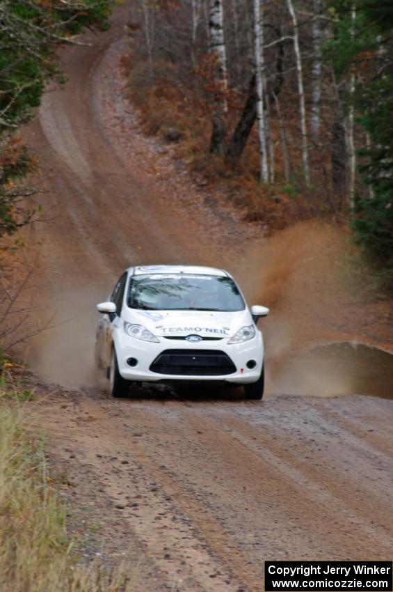 Joseph Burke / Alex Kihurani in their Ford Fiesta R2 near the finish of SS10 (Menge Creek 1)