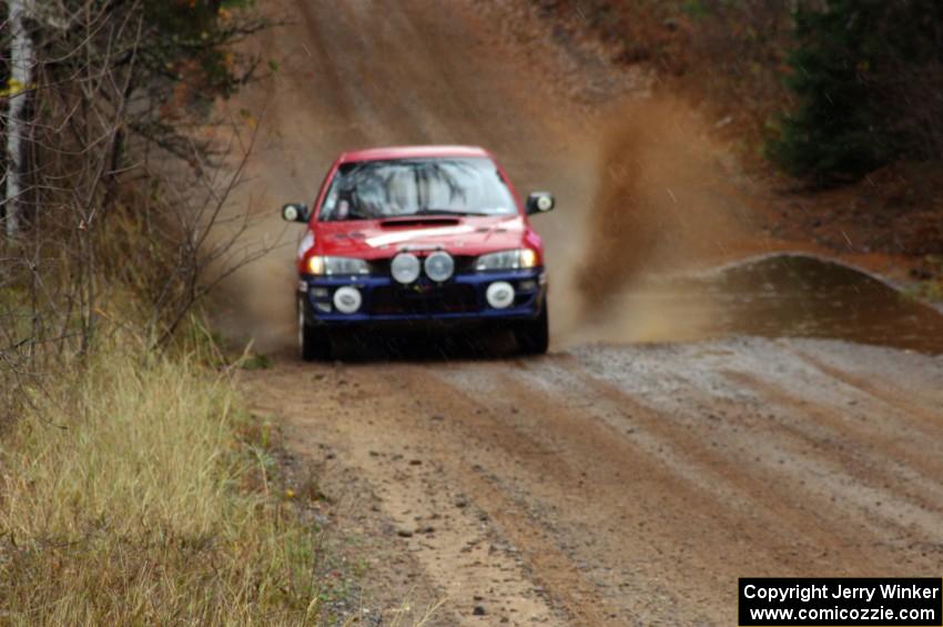 Brianne Corn / Jeremy Rowland in their Subaru Impreza near the finish of SS10 (Menge Creek 1)