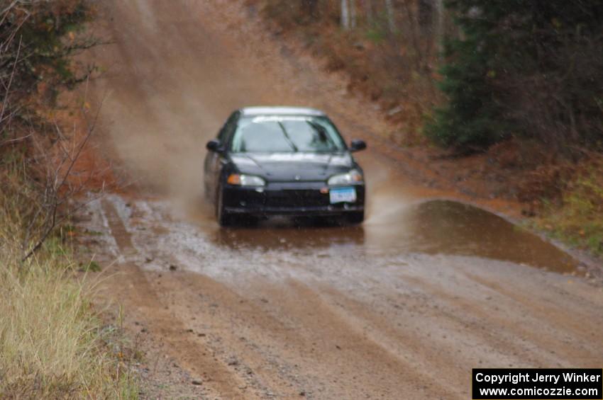 Silas Himes / Matt Himes in their Honda Civic near the finish of SS10 (Menge Creek 1)