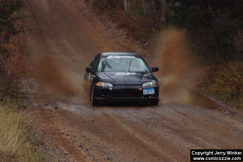 Silas Himes / Matt Himes in their Honda Civic near the finish of SS10 (Menge Creek 1)