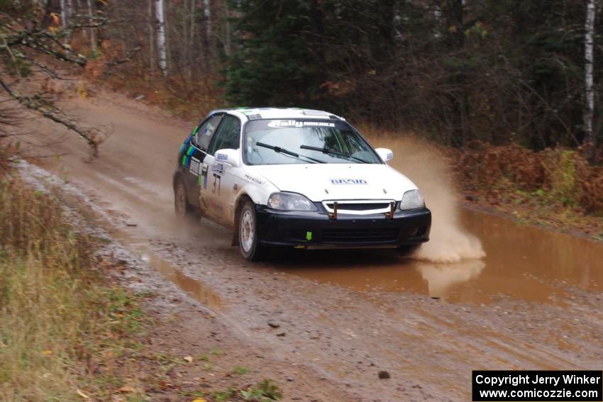 Billy Mann / Mary Warren in their Honda Civic near the finish of SS10 (Menge Creek 1)