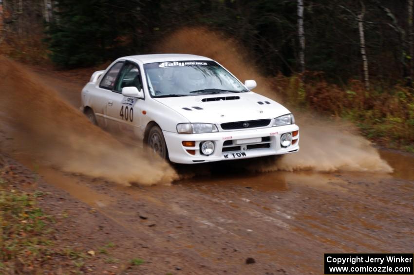 Tyler Witte / Rob Bohn in their Subaru Impreza near the finish of SS10 (Menge Creek 1)