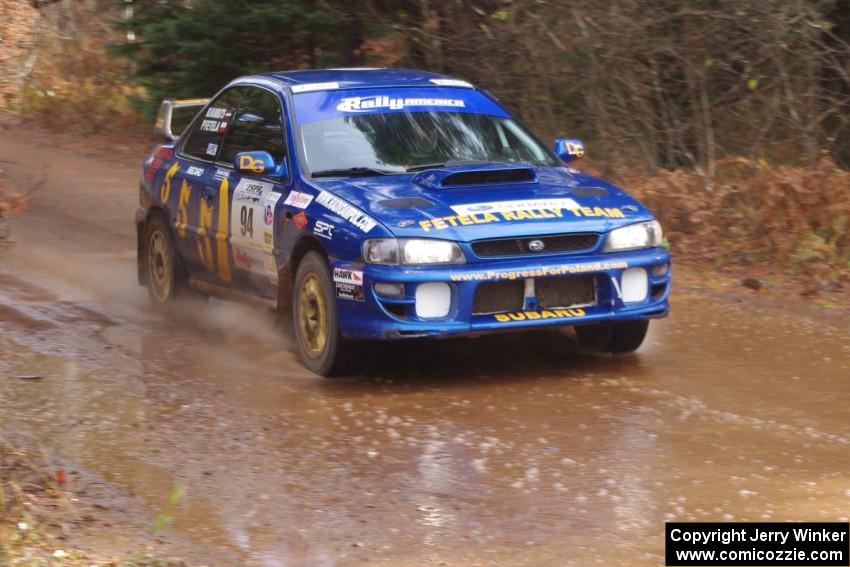 Piotr Fetela / Ray Vambuts in their Subaru Impreza STi near the finish of SS10 (Menge Creek 1)