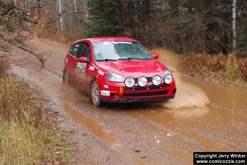 Cameron Steely / Josh Buller in their Ford Focus near the finish of SS10 (Menge Creek 1)