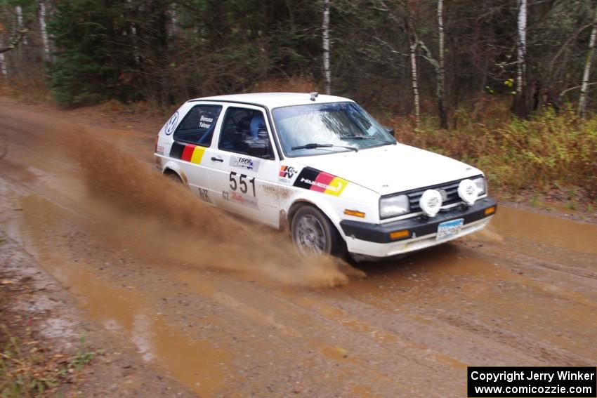 Kristofer Yahner / Tony Benusa in their VW Golf near the finish of SS10 (Menge Creek 1)