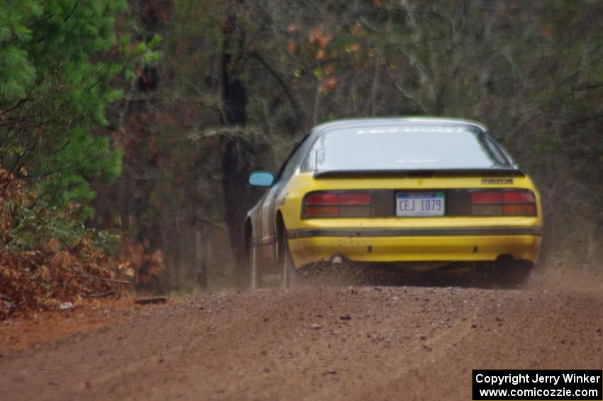 Mychal Summers / Ryan DesLaurier in their Mazda RX-7 on SS10 (Menge Creek 1)