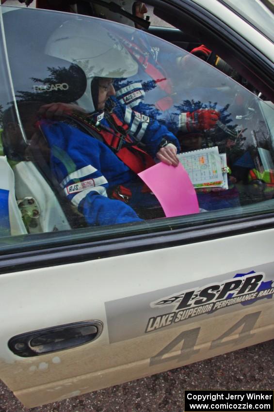 Henry Krolikowski / Cindy Krolikowski in their Subaru Impreza about to head back out after L'Anse service