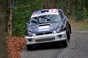 Adam Yeoman / Jordan Schulze in their Subaru Impreza catch air on SS13 (Herman 1)