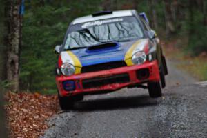 Janusz Topor / Michal Kaminski in their Subaru WRX STi catch air on SS13 (Herman 1)