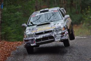 Mason Moyle / Gary Barton in their Subaru Impreza 2.5RS catch air on SS13 (Herman 1)