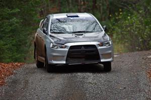 Vio Dobasu / Nathalie Richard in their Mitsubishi Lancer Evo X on SS13 (Herman 1)