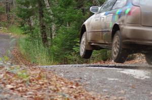 Billy Mann / Mary Warren in their Honda Civic catch air on SS13 (Herman 1)