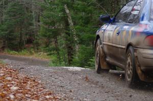 Piotr Fetela / Ray Vambuts in their Subaru Impreza STi catch air on SS13 (Herman 1)